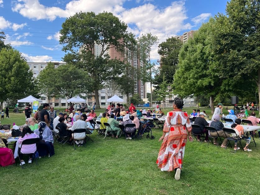 An outdoor community art session in a park